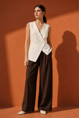 Woman modeling ivory double breasted tailored vest